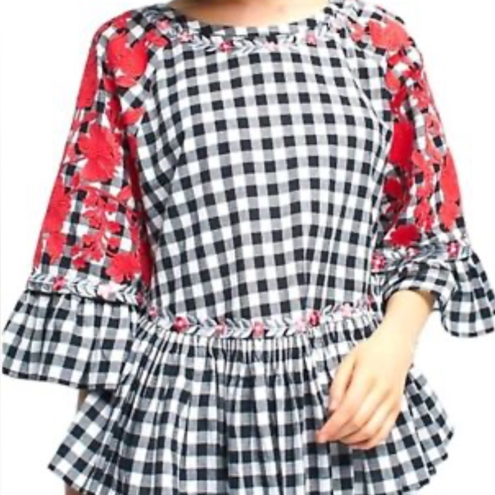 Pankaj and Nidhi  Black and White Checkered too Red Floral Accents.  Size large